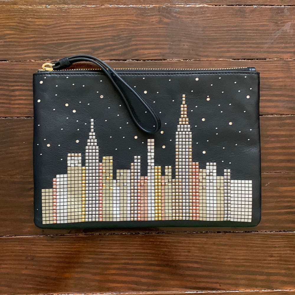 New Kate spade clutch with rhinestone detailing.
